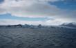 Nuo ledo laisvas pilkas vanduo (Prie eero, ledo eero. Jokulsarlon, Islandija)